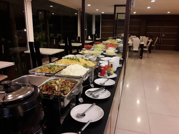 Imagen del bar/restaurante del Hotel The Residence 304 Prachinburi. Foto 6