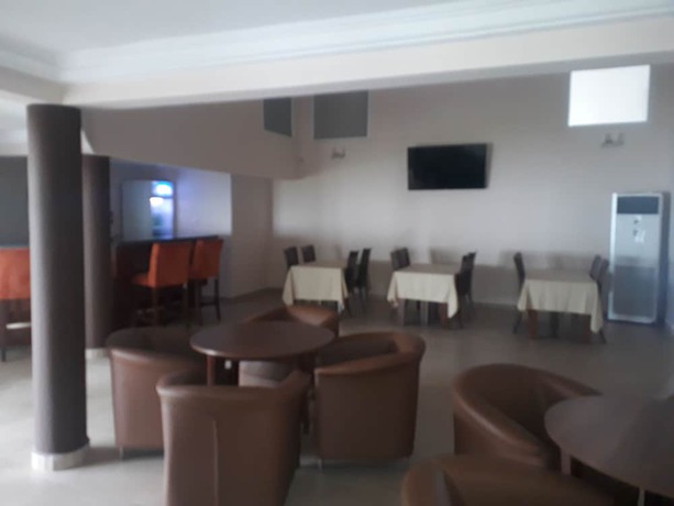 Imagen del bar/restaurante del Hotel The Residence, Achimota. Foto 7