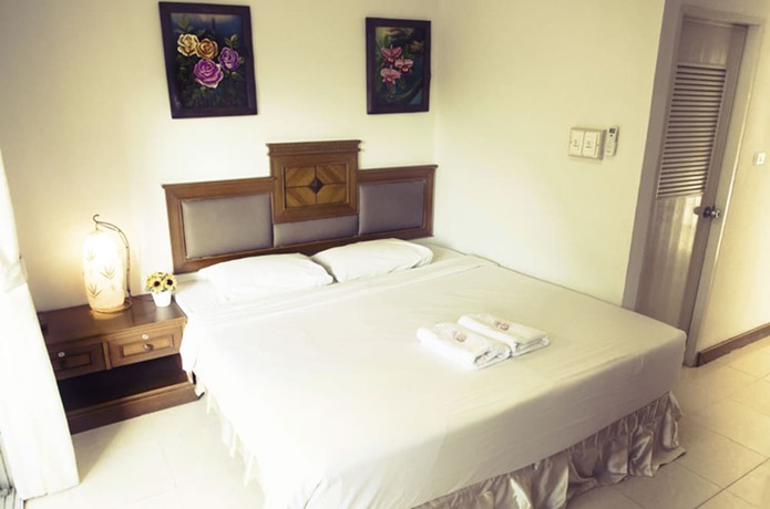 Imagen de la habitación del Hotel The Residence, Chiang Mai. Foto 5
