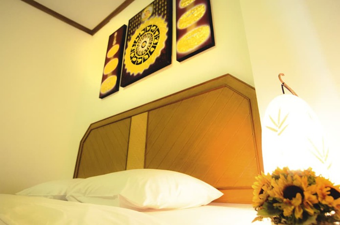 Imagen de la habitación del Hotel The Residence, Chiang Mai. Foto 8