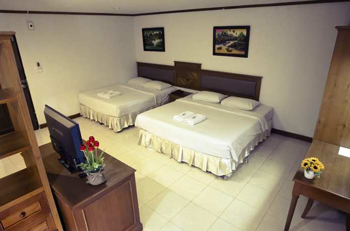 Imagen de la habitación del Hotel The Residence, Chiang Mai. Foto 9