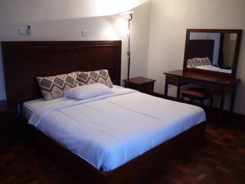 Imagen de la habitación del Hotel The Residence Entebbe. Foto 4