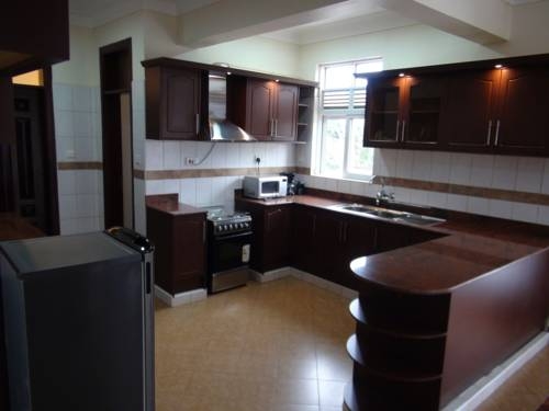 Imagen de la habitación del Hotel The Residence Entebbe. Foto 8