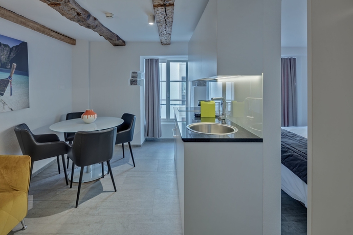 Imagen de la habitación del Hotel The Residence La Cittadella. Foto 6