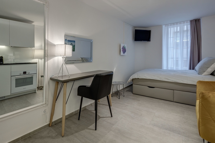Imagen de la habitación del Hotel The Residence La Cittadella. Foto 13