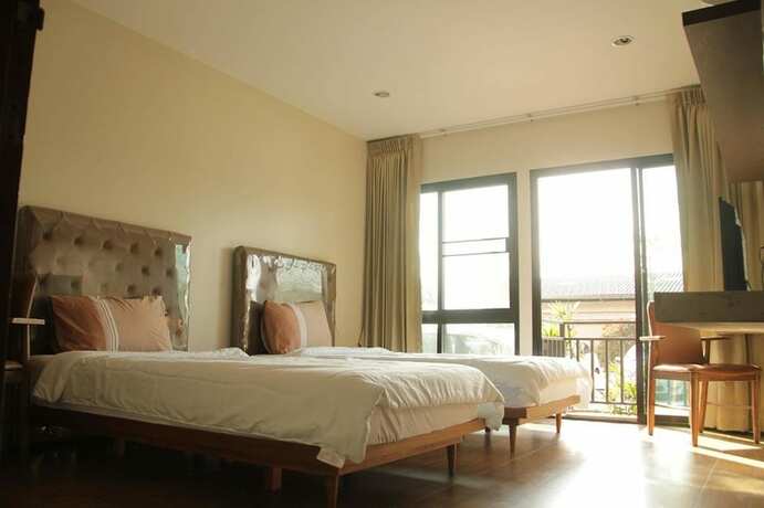 Imagen de la habitación del Hotel The Residence Thepkanjana. Foto 13