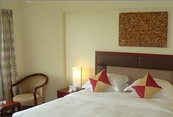 Imagen de la habitación del Hotel The Residence and Apartments. Foto 4
