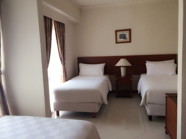 Imagen de la habitación del Hotel The Residences At Puri Casablanca. Foto 2