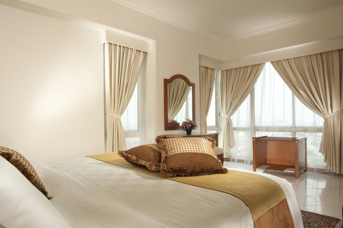 Imagen de la habitación del Hotel The Residences At Puri Casablanca. Foto 3