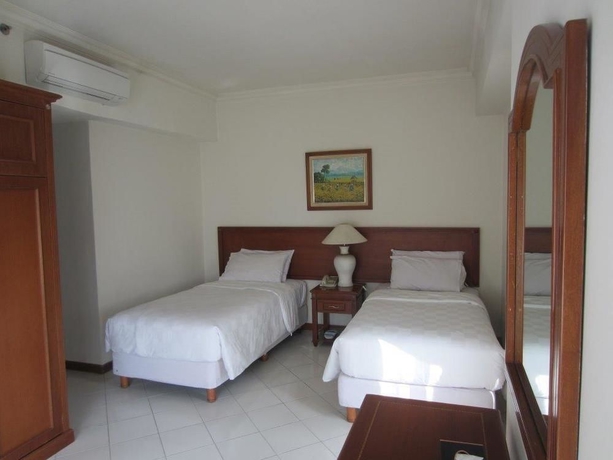 Imagen de la habitación del Hotel The Residences At Puri Casablanca. Foto 5