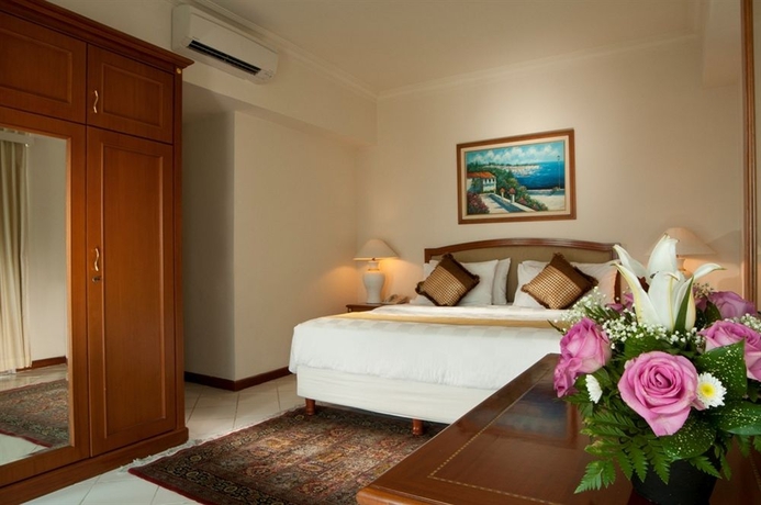Imagen de la habitación del Hotel The Residences At Puri Casablanca. Foto 8