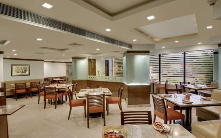 Imagen del bar/restaurante del Hotel The Residency, Chennai. Foto 4