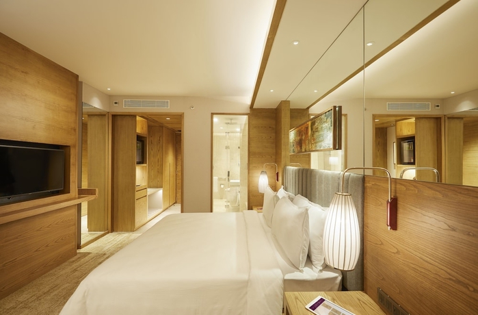 Imagen de la habitación del Hotel The Residency Towers. Foto 2