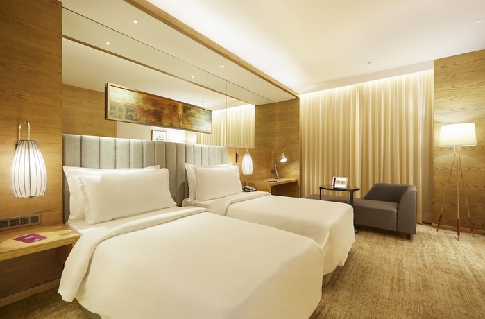 Imagen de la habitación del Hotel The Residency Towers. Foto 10