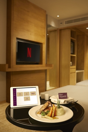 Imagen de la habitación del Hotel The Residency Towers. Foto 12