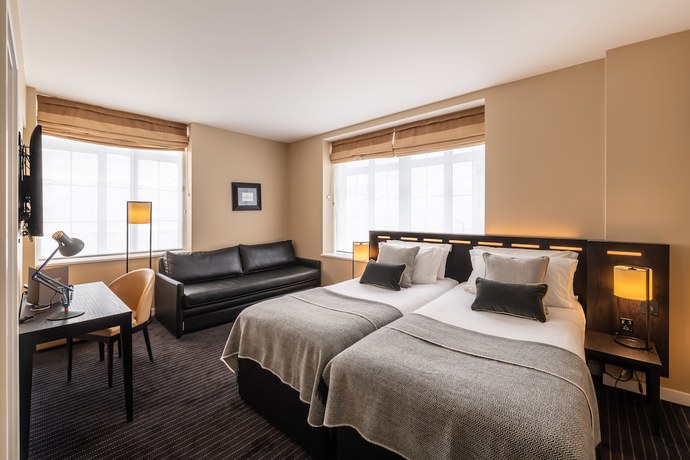 Imagen de la habitación del Hotel The Resident Victoria. Foto 5