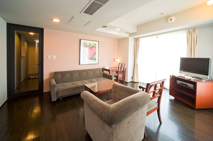 Imagen de la habitación del Hotel The Residential Suites Fukuoka. Foto 3