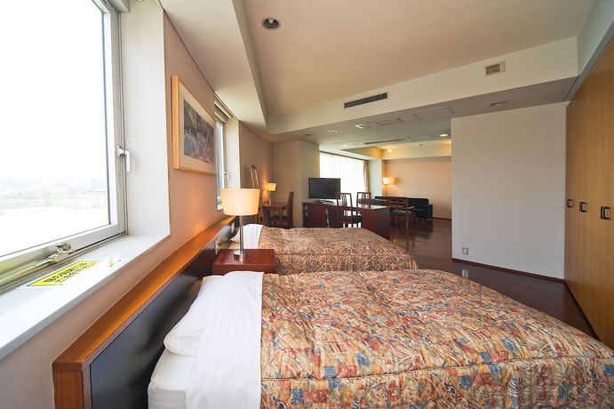 Imagen de la habitación del Hotel The Residential Suites Fukuoka. Foto 4