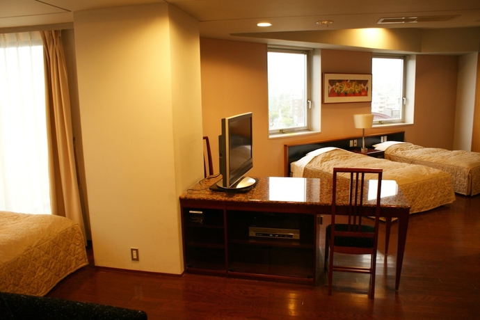 Imagen de la habitación del Hotel The Residential Suites Fukuoka. Foto 5