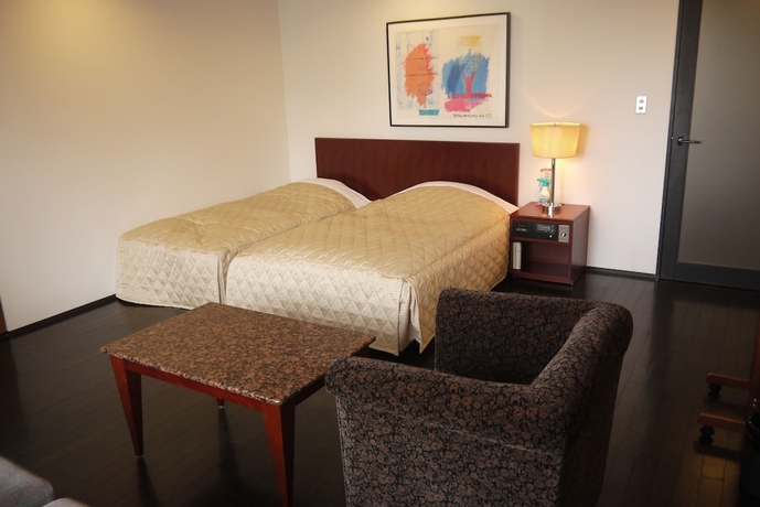 Imagen de la habitación del Hotel The Residential Suites Fukuoka. Foto 6