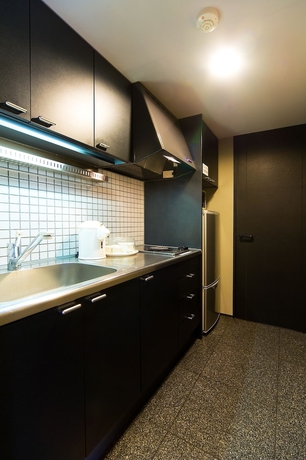 Imagen de la habitación del Hotel The Residential Suites Fukuoka. Foto 8