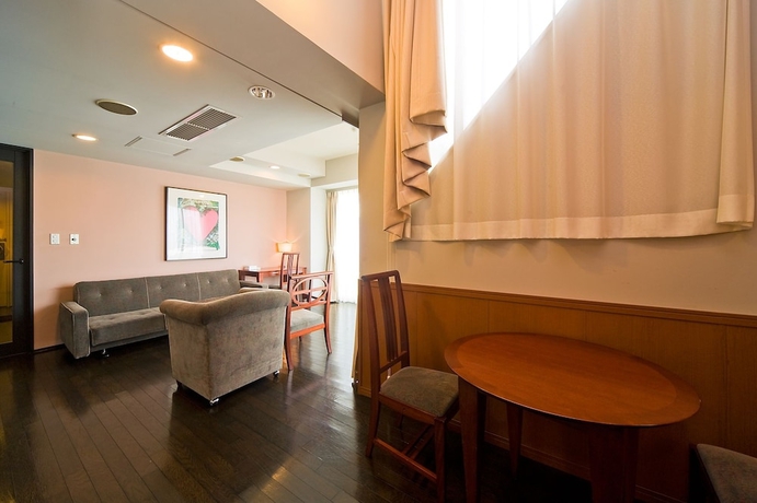 Imagen de la habitación del Hotel The Residential Suites Fukuoka. Foto 10