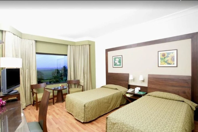 Imagen de la habitación del Hotel The Retreat And Convention Centre. Foto 6