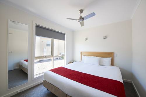 Imagen de la habitación del Hotel The Retreat At West Beach Parks. Foto 5