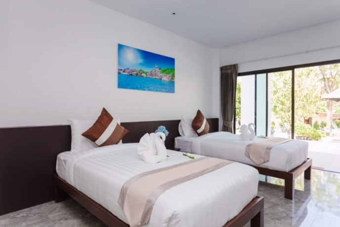 Imagen de la habitación del Hotel The Retreat Khaolak Resort. Foto 17