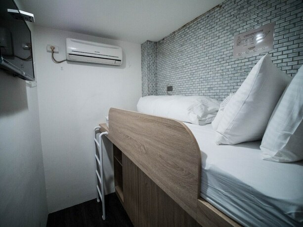 Imagen de la habitación del Hotel The Retro Tai-Pan 2, Tainan. Foto 13