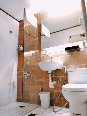 Imagen de la habitación del Hotel The Retro Tai-Pan 2, Tainan. Foto 14