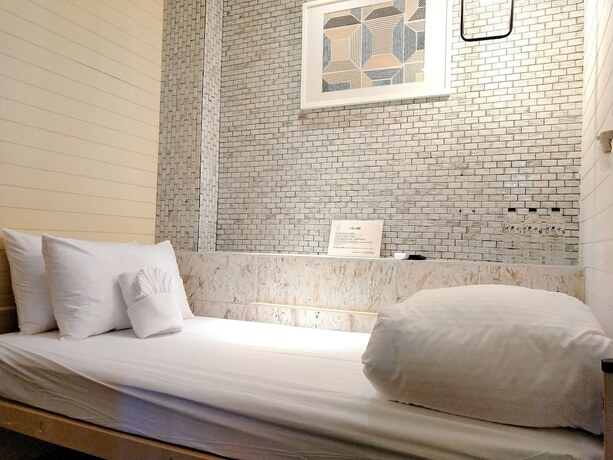 Imagen de la habitación del Hotel The Retro Tai-Pan 2, Tainan. Foto 15