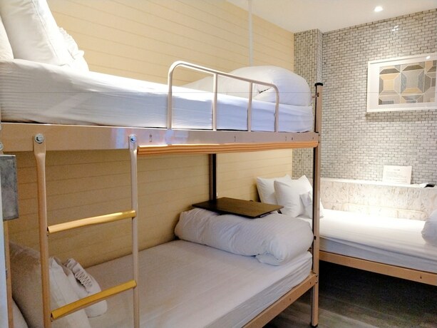 Imagen de la habitación del Hotel The Retro Tai-Pan 2, Tainan. Foto 16