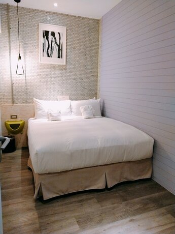 Imagen de la habitación del Hotel The Retro Tai-Pan 2, Tainan. Foto 17