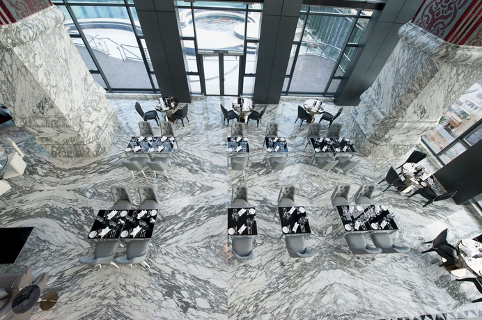 Imagen del bar/restaurante del Hotel The Reverie Saigon. Foto 4