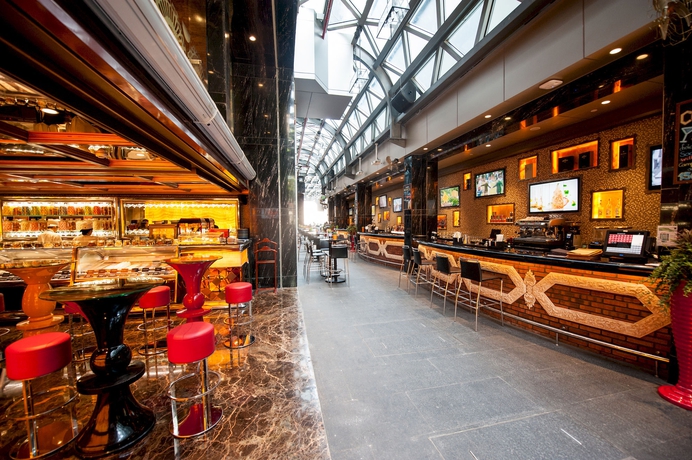 Imagen del bar/restaurante del Hotel The Reverie Saigon. Foto 7