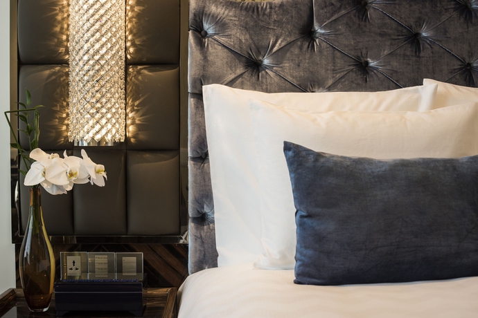 Imagen de la habitación del Hotel The Reverie Saigon. Foto 12