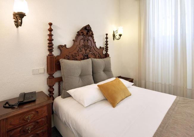 Imagen de la habitación del Hotel The Rex, Oporto. Foto 7