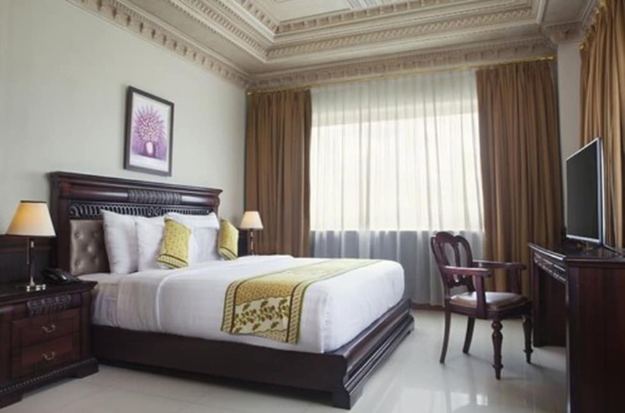 Imagen de la habitación del Hotel The Rich Jogja. Foto 4