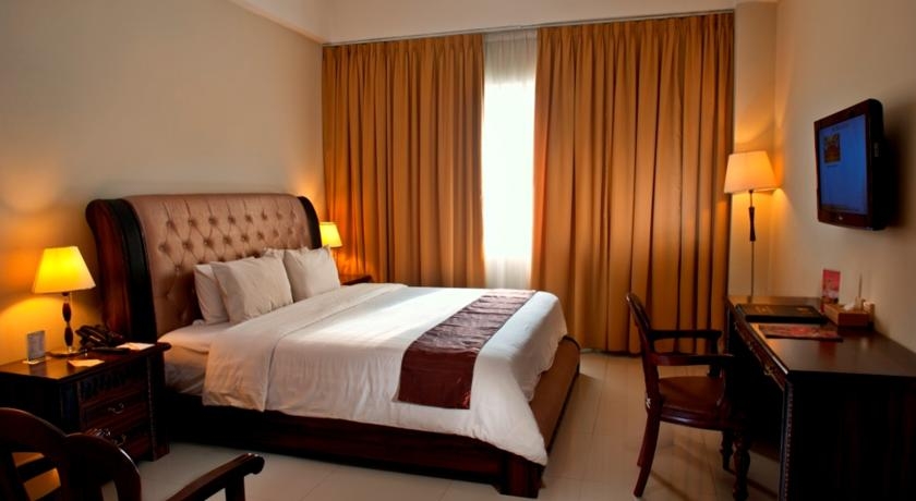 Imagen de la habitación del Hotel The Rich Jogja. Foto 5