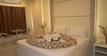 Imagen de los interiores del Hotel The Rich Residence, Surat Thani. Foto 7