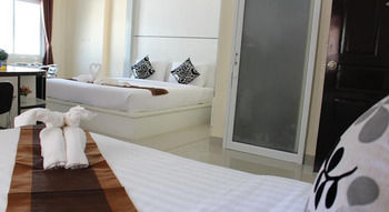 Imagen de los interiores del Hotel The Rich Residence, Surat Thani. Foto 9