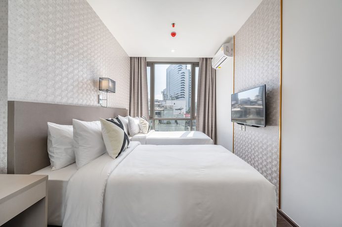Imagen de la habitación del Hotel The Rich Residences Sukhumvit Nana. Foto 13