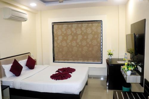 Imagen de la habitación del Hotel The Richi Rich And Resort. Foto 15