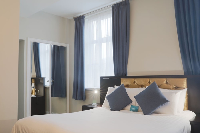 Imagen de la habitación del Hotel The Richmond. Foto 9