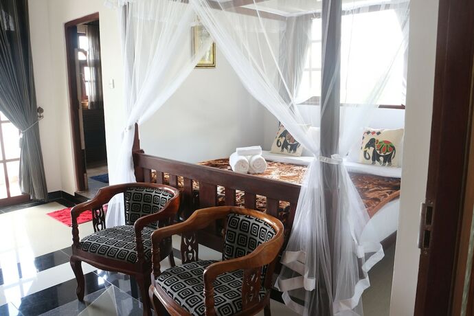 Imagen de la habitación del Hotel The Richmond House Grand. Foto 16