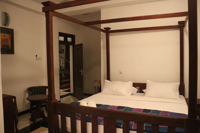 Imagen de la habitación del Hotel The Richmond House Grand. Foto 18