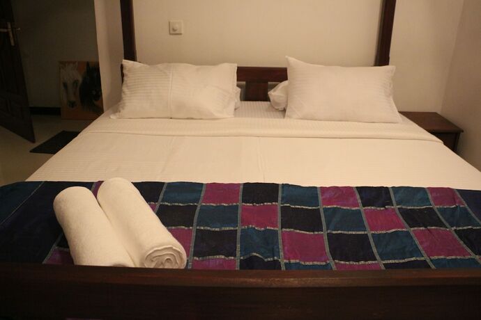 Imagen de la habitación del Hotel The Richmond House Grand. Foto 19