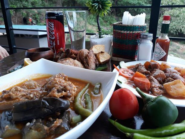 Imagen del bar/restaurante del Hotel The Ridge Coron. Foto 6