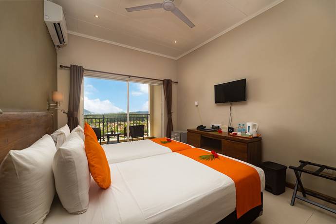 Imagen de la habitación del Hotel The Ridge Residence. Foto 16